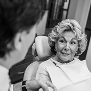 Woman discussing the benefits of Botox Cosmetic with dentist