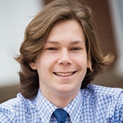 Young man sharing smile after zoom teeth whitening