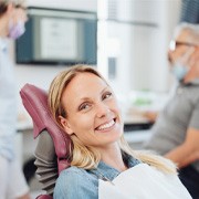 Woman smiling in the dental chair