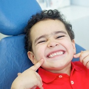 Child smiles after frenectomy in Cleveland