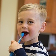 Young child smiling after children's dentistry visit