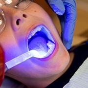 Patient receiving dental sealants