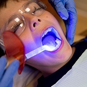 Patient receiving tooth colored filling