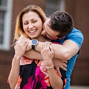 Man and woman smiling after sedation dentistry