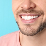 Man smiling after dental appointment in Pepper Pike