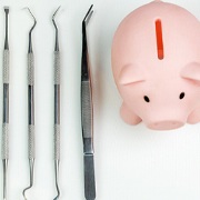 Piggy bank and dental instruments in Pepper Pike