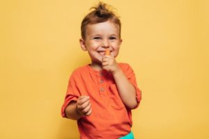 boy eating carrots