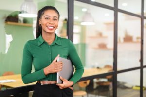 woman smiling at her job