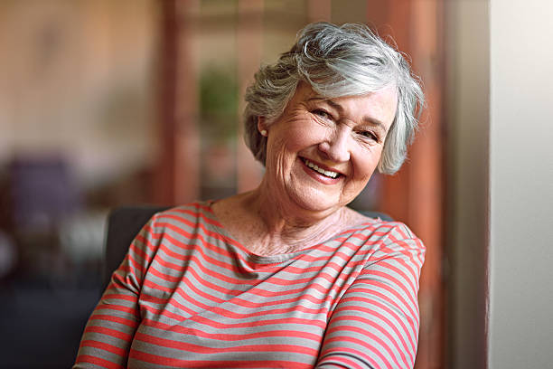 person with dentures smiling